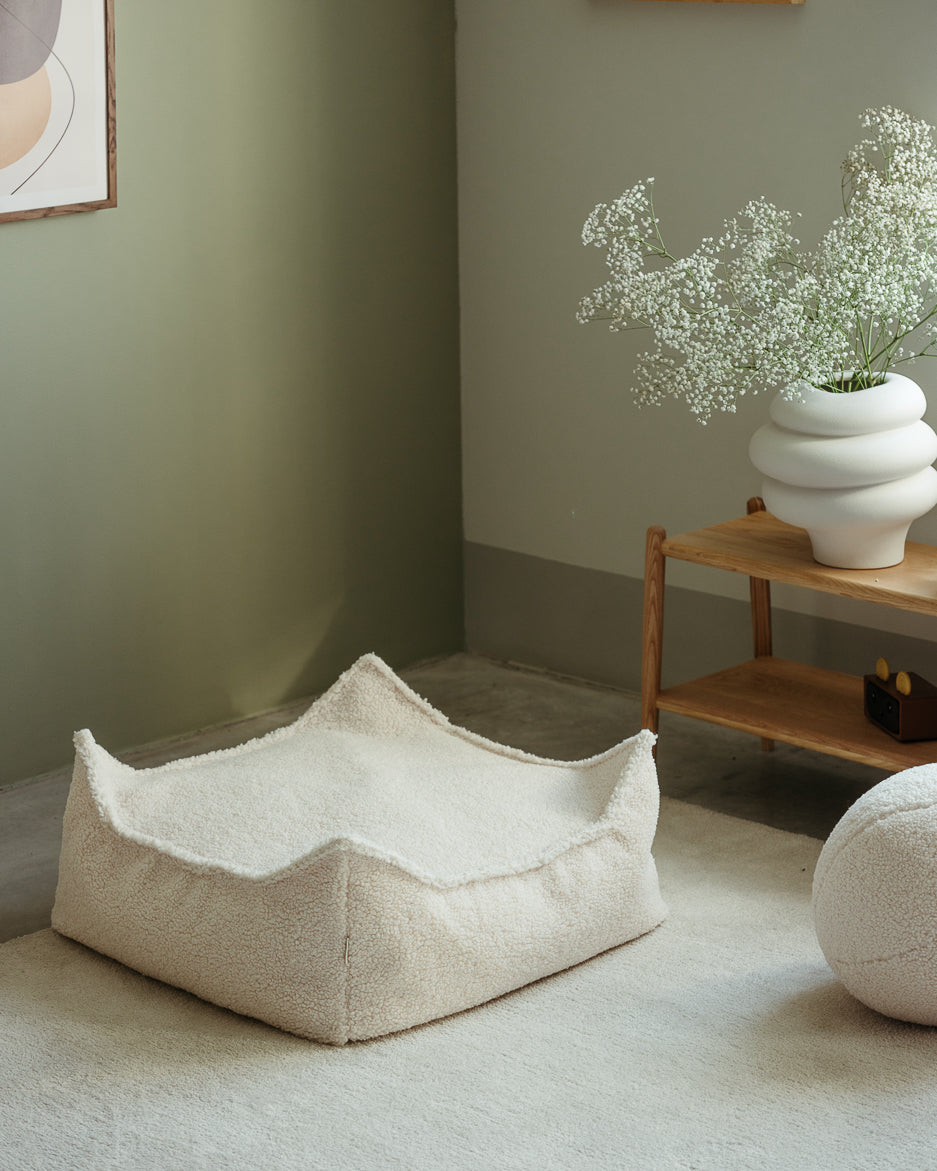 wigiwama Sitzkissen Ottoman in Creme aus Teddy-Stoff